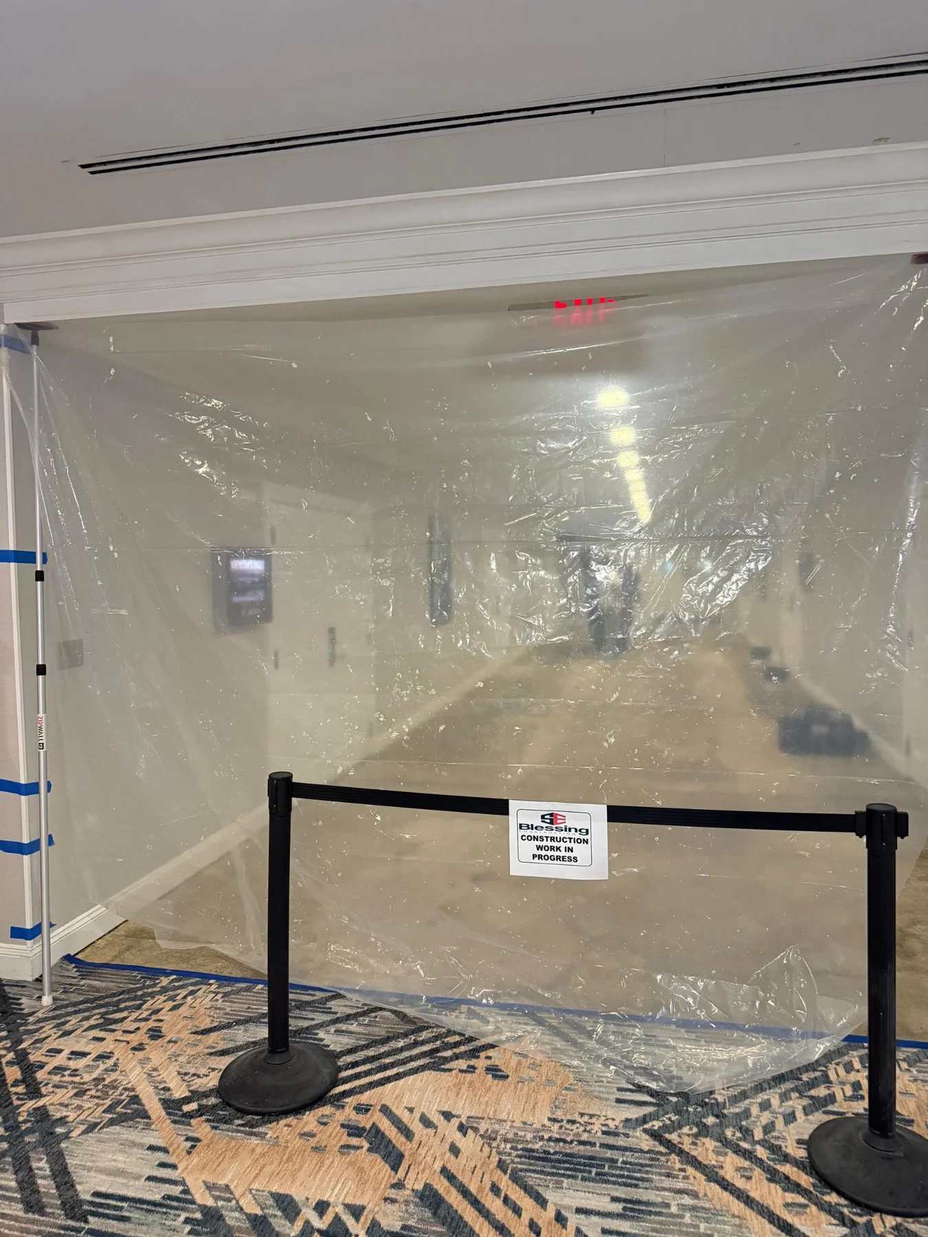 Protective sheeting and a work-in-progress barrier at the hallway entrance at DoubleTree by Hilton, Jacksonville