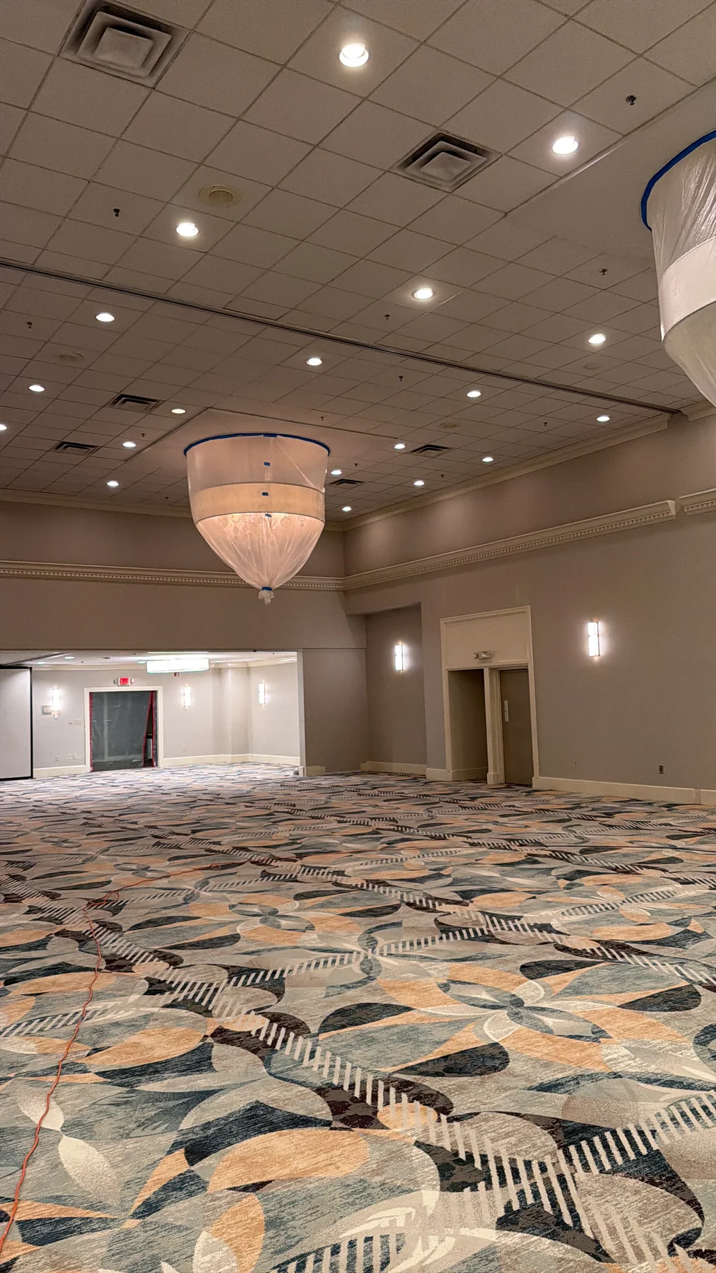 Installed carpet across the ballroom, with other room work ongoing at DoubleTree by Hilton, Jacksonville
