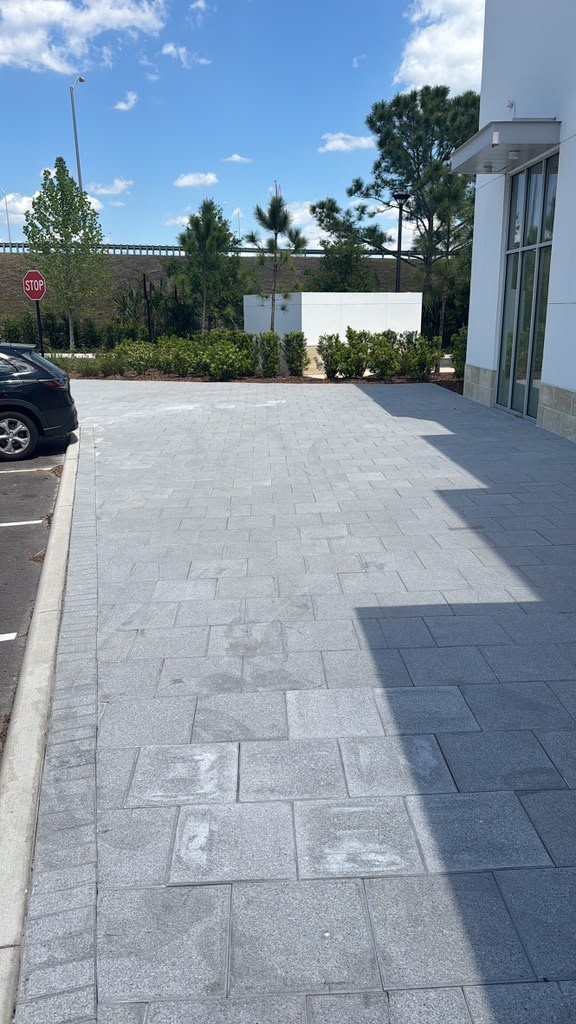 Paved exterior and facade before the canopy installation.
